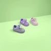 Three pairs of children's sports shoes are available in grey, purple and pink Item Picture